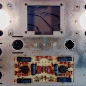 After removing the quad cap, Now, un-solder the power transformer wires, making sure that you un-solder ALL of them! Then remove the power transformer, being very careful not to damage any of the wires! Here's the result.